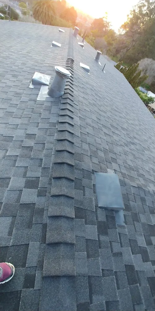 Slide of T D Roofing