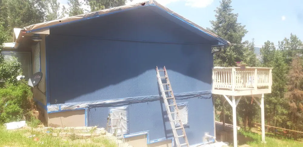 Slide of T Hackbarth Roofing