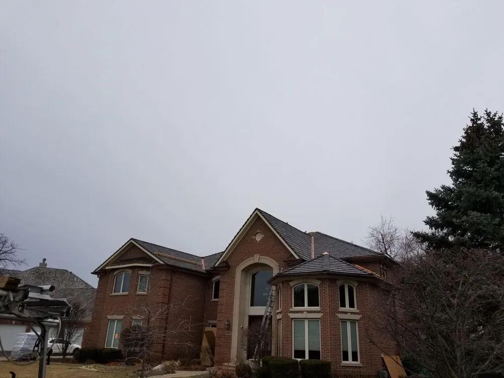 Emergency shingle roofing service in Village of Lakewood, IL by T J Builders & Developers