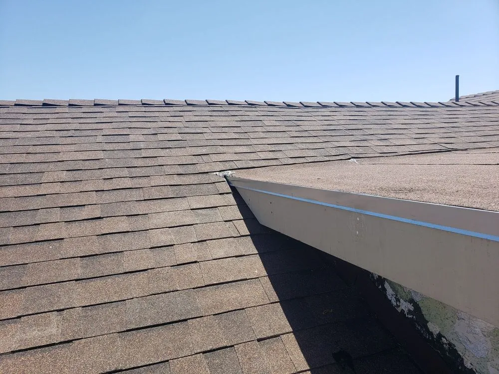 Slide of T J Roofing