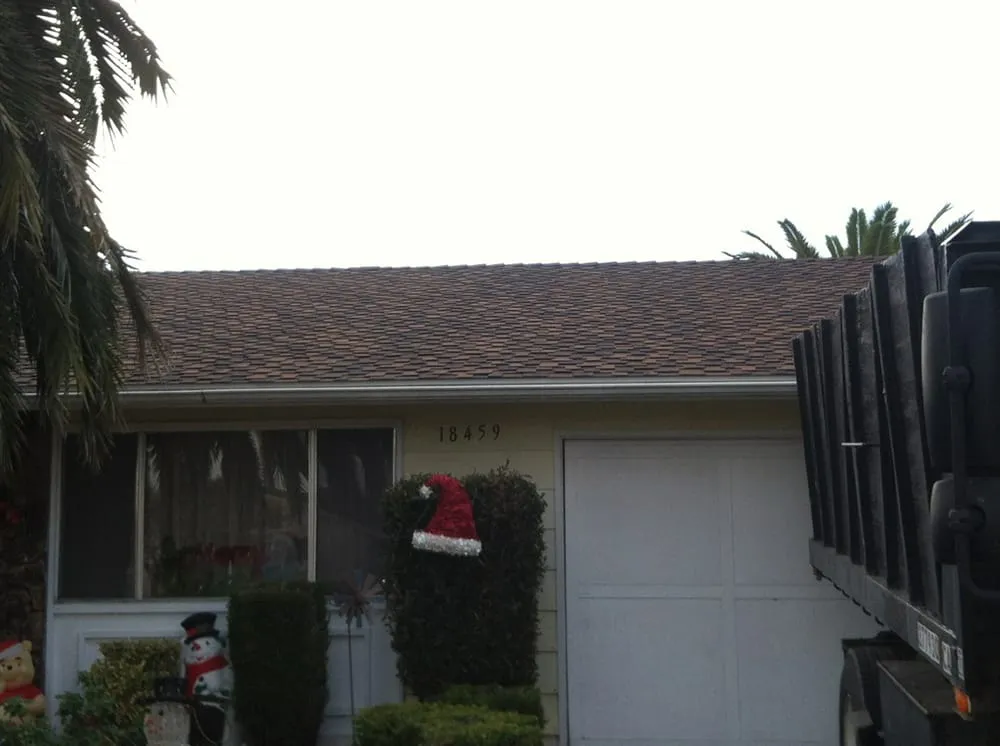 Slide of T J Roofing