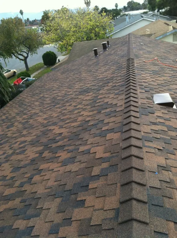 Slide of T J Roofing