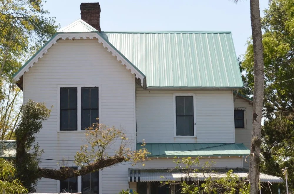 Slide of T Mark Roofing