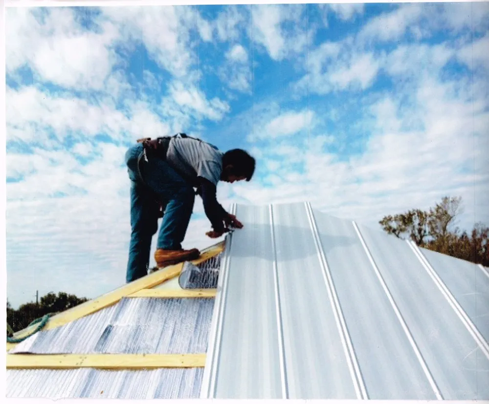 Slide of T Mark Roofing