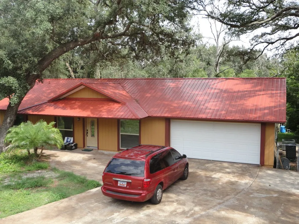 Slide of T Mark Roofing