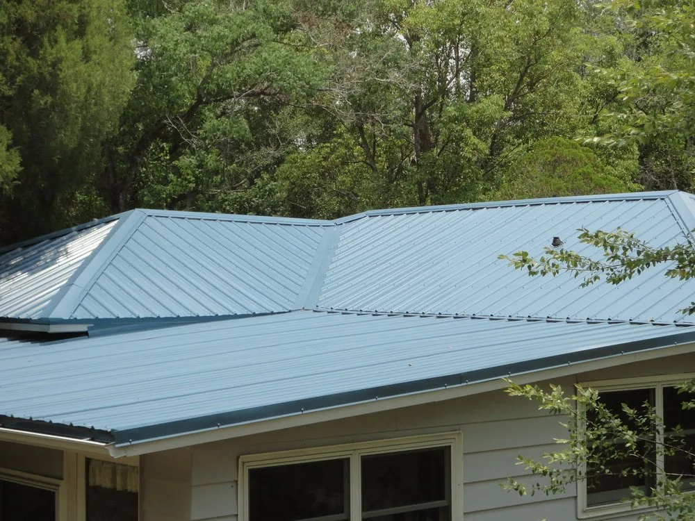 Slide of T Mark Roofing