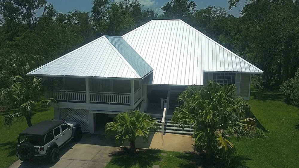 Slide of T Mark Roofing