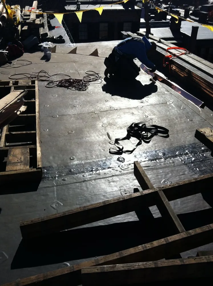 Slide of T Morrell Gutters & Roofing