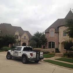 Slide of T Rock Roofing & Construction