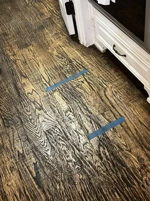 T Rock Roofing & Construction Logo