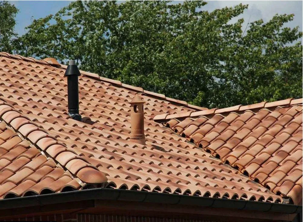 Slide of T Rock Roofing & Construction