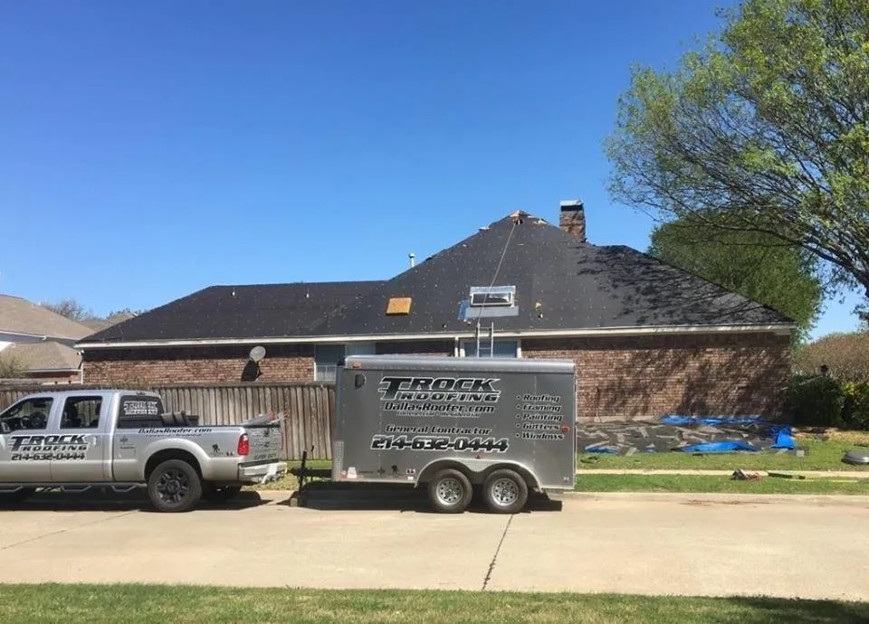 Slide of T Rock Roofing & Construction