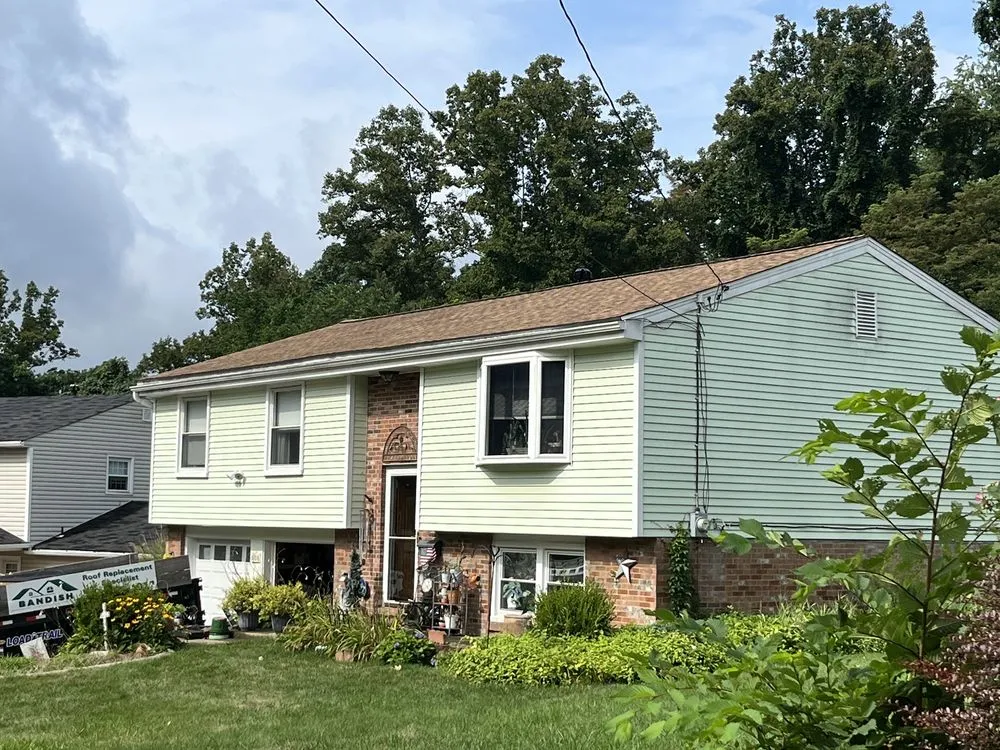 Slide of T Rosinsky Roofing