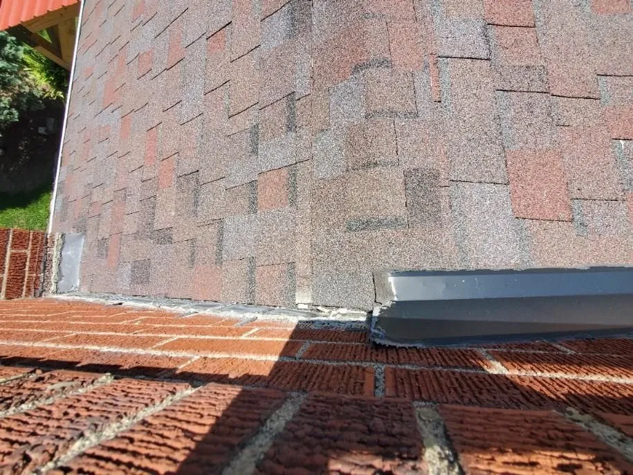 Slide of T Rosinsky Roofing