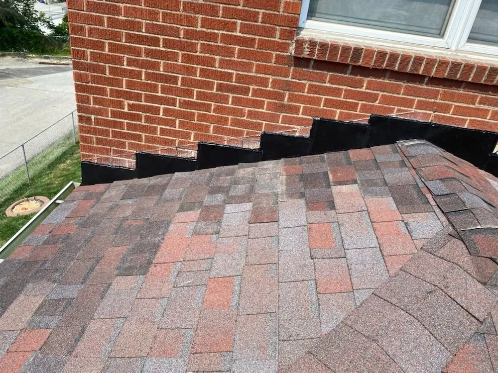 Slide of T Rosinsky Roofing