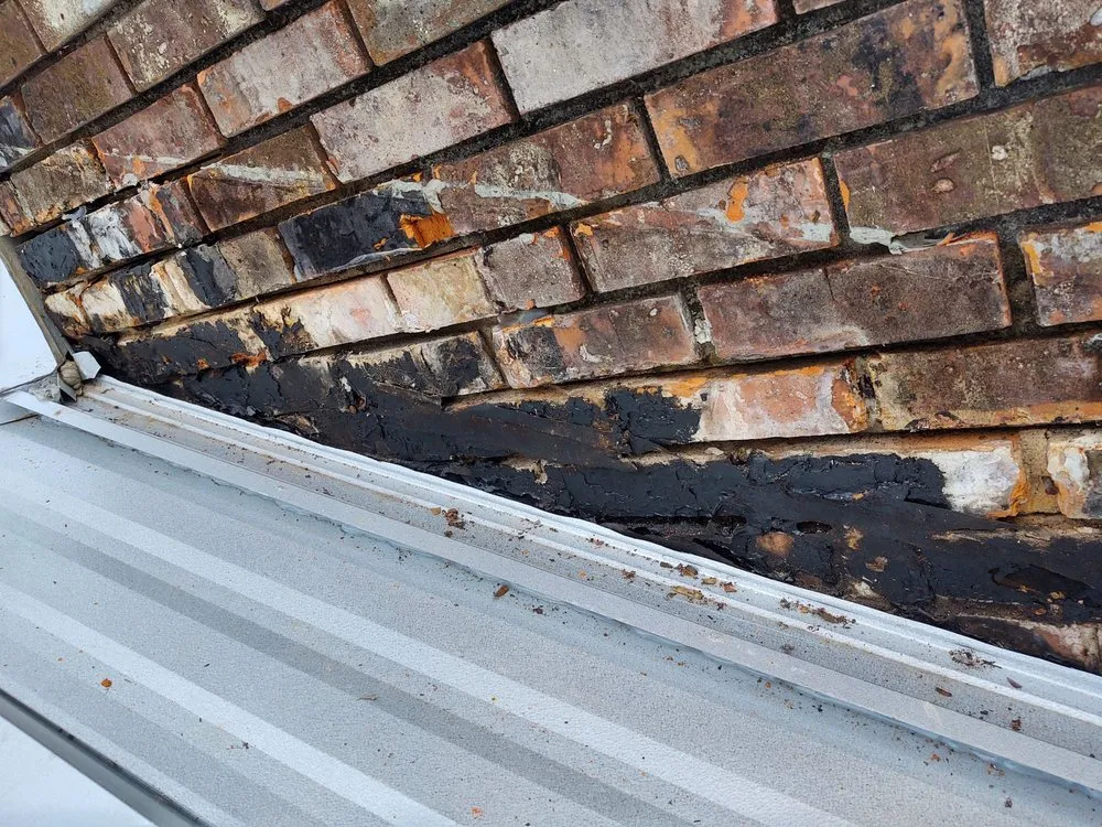 Slide of T-Roy's Relief Roofing