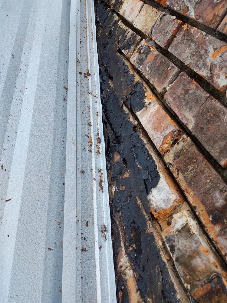 Slide of T-Roy's Relief Roofing