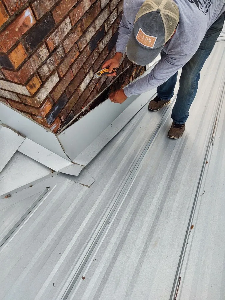 Slide of T-Roy's Relief Roofing