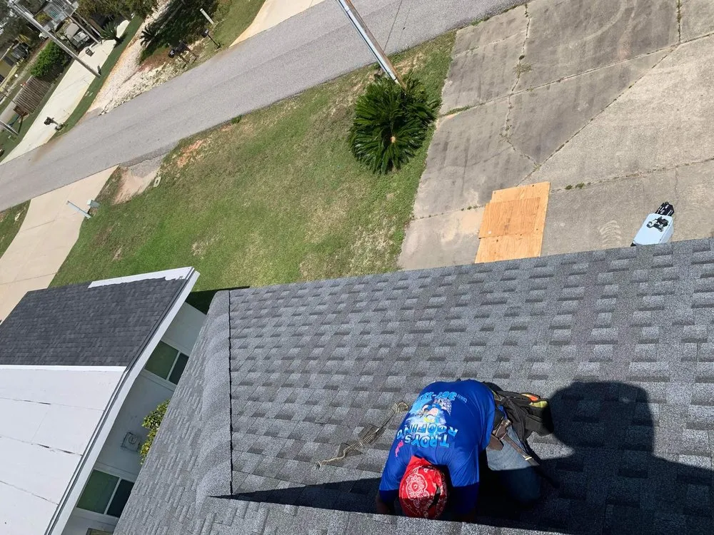 Slide of T-Roys Relief Roofing