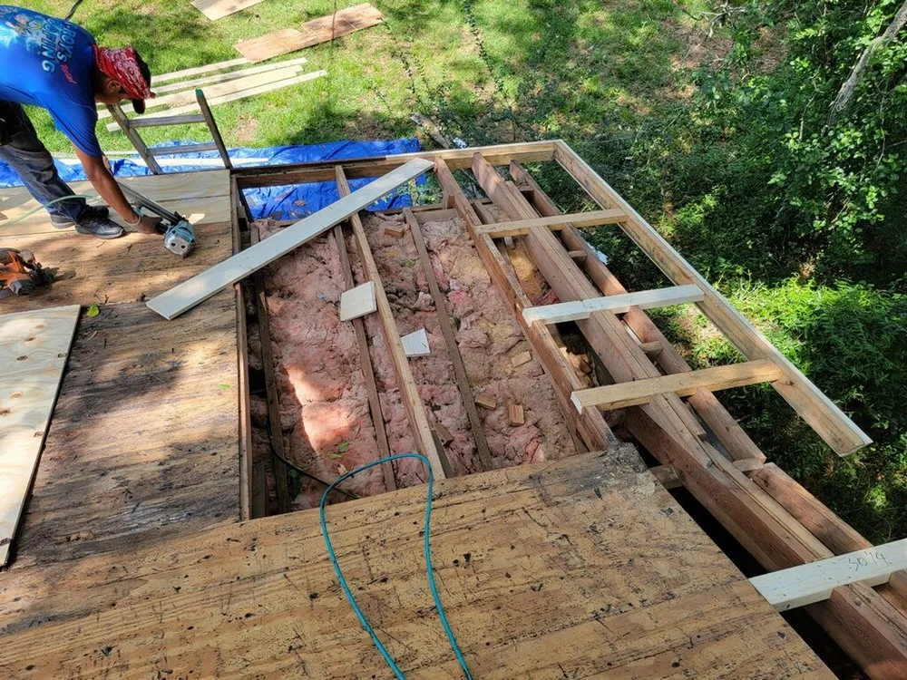 Slide of T-Roys Relief Roofing