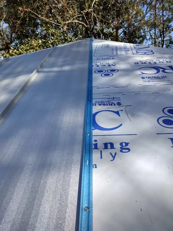 Slide of T-Roys Relief Roofing