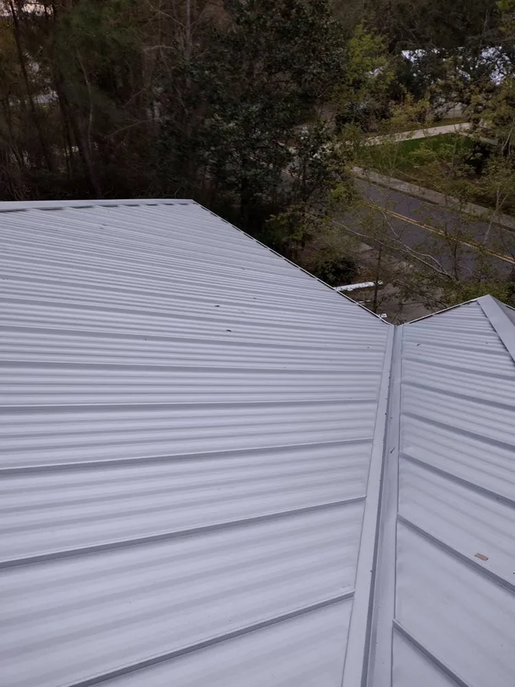 Slide of T-Roys Relief Roofing