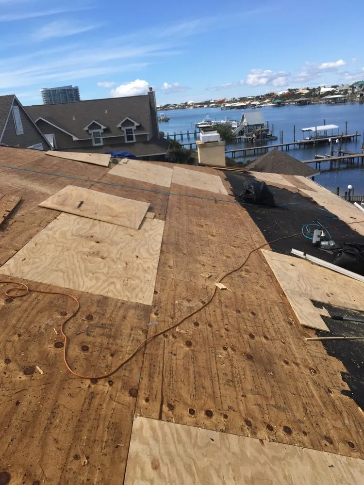 Slide of T-Roys Relief Roofing