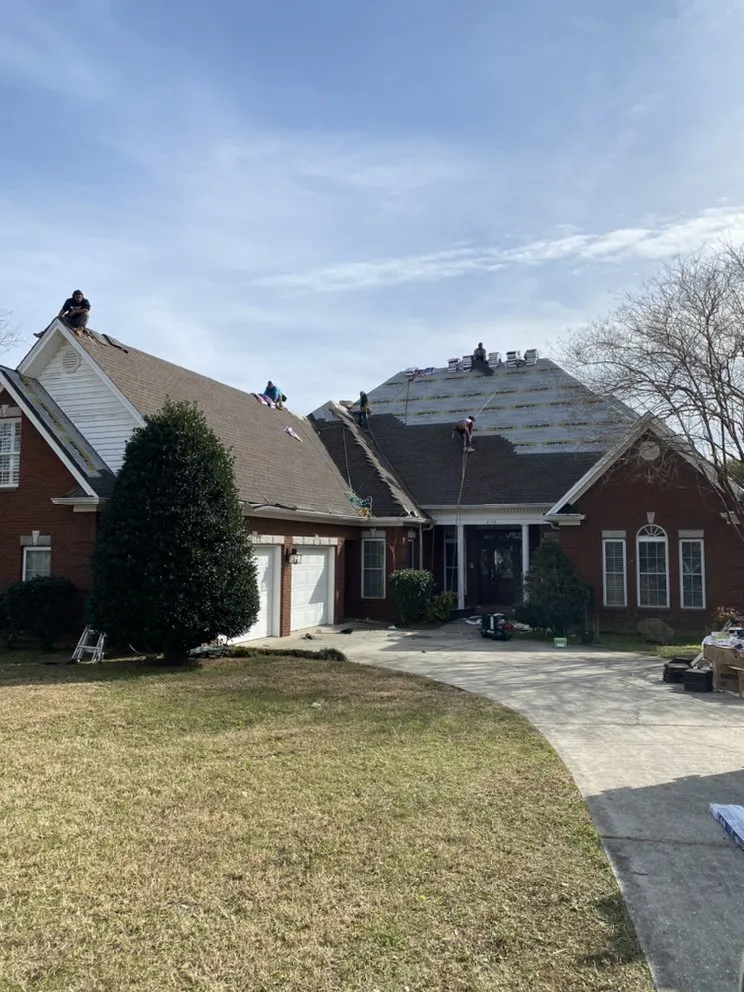 Slide of T-Roys Relief Roofing