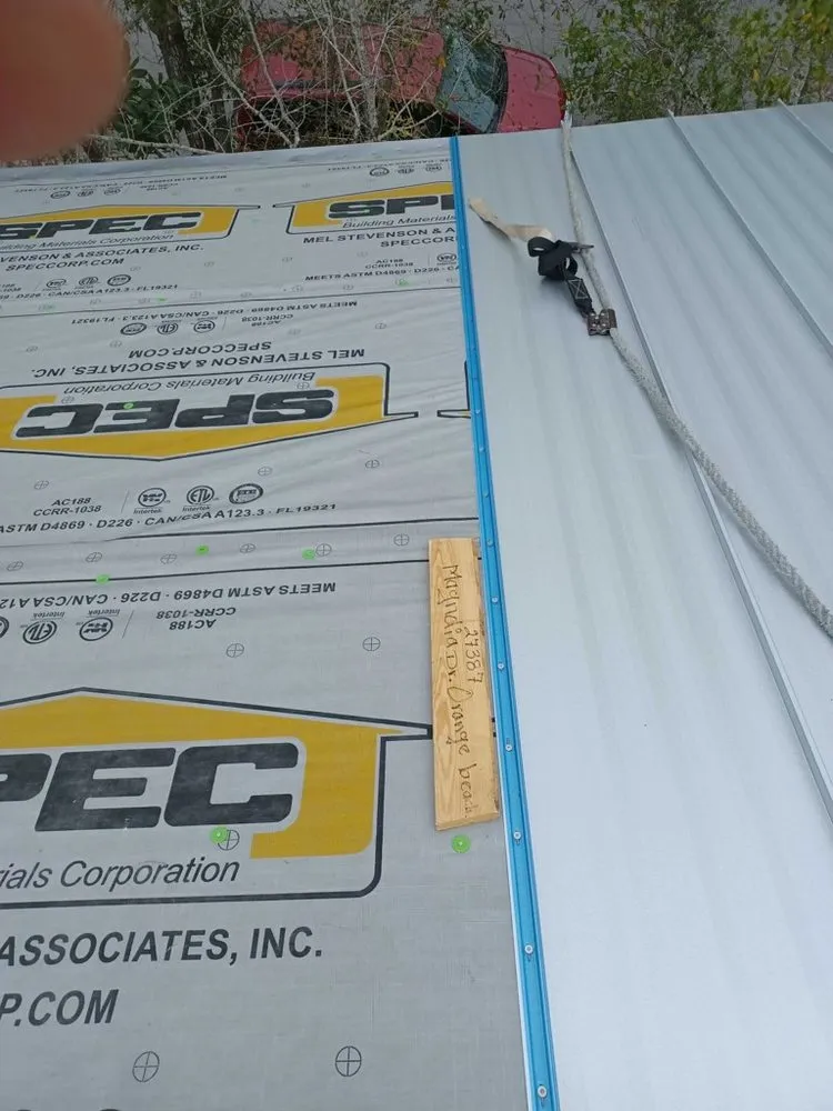 Slide of T-Roys Relief Roofing