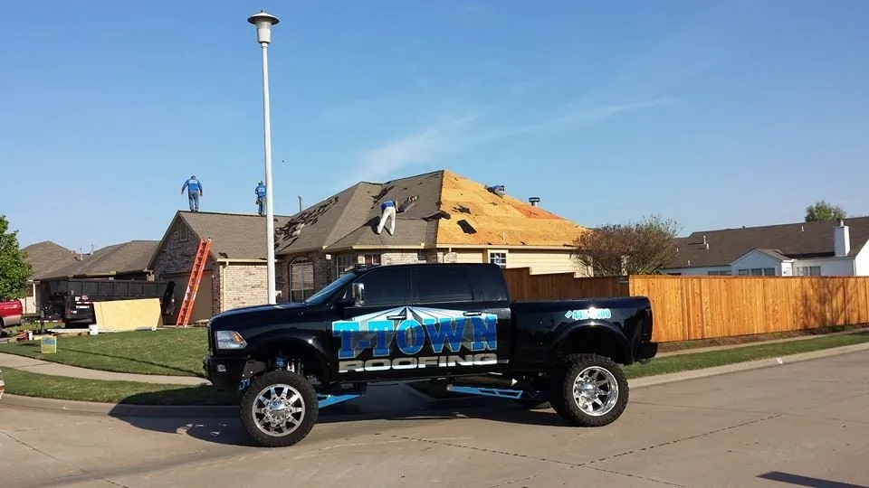 Slide of T Town Roofing