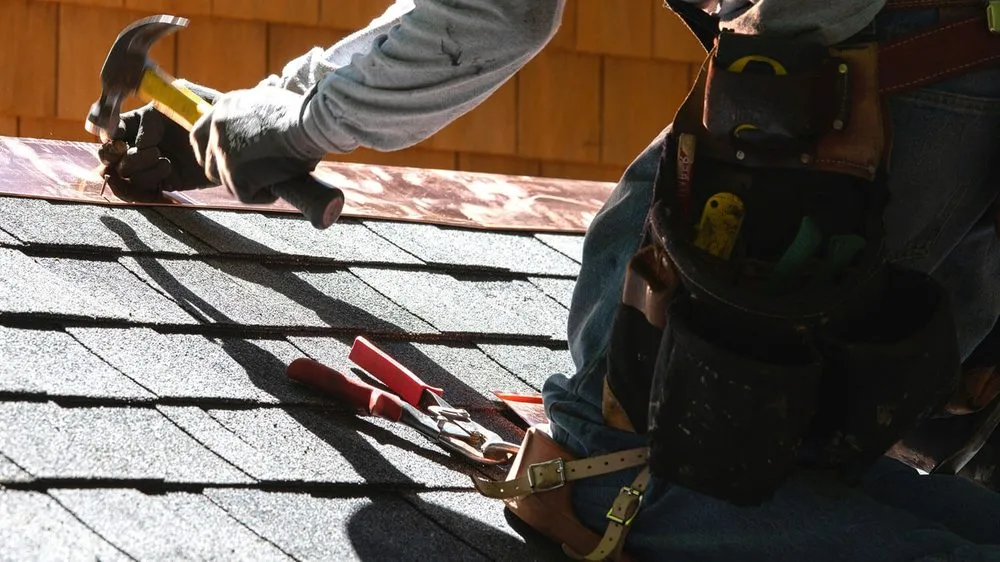 Slide of T2K Roofing