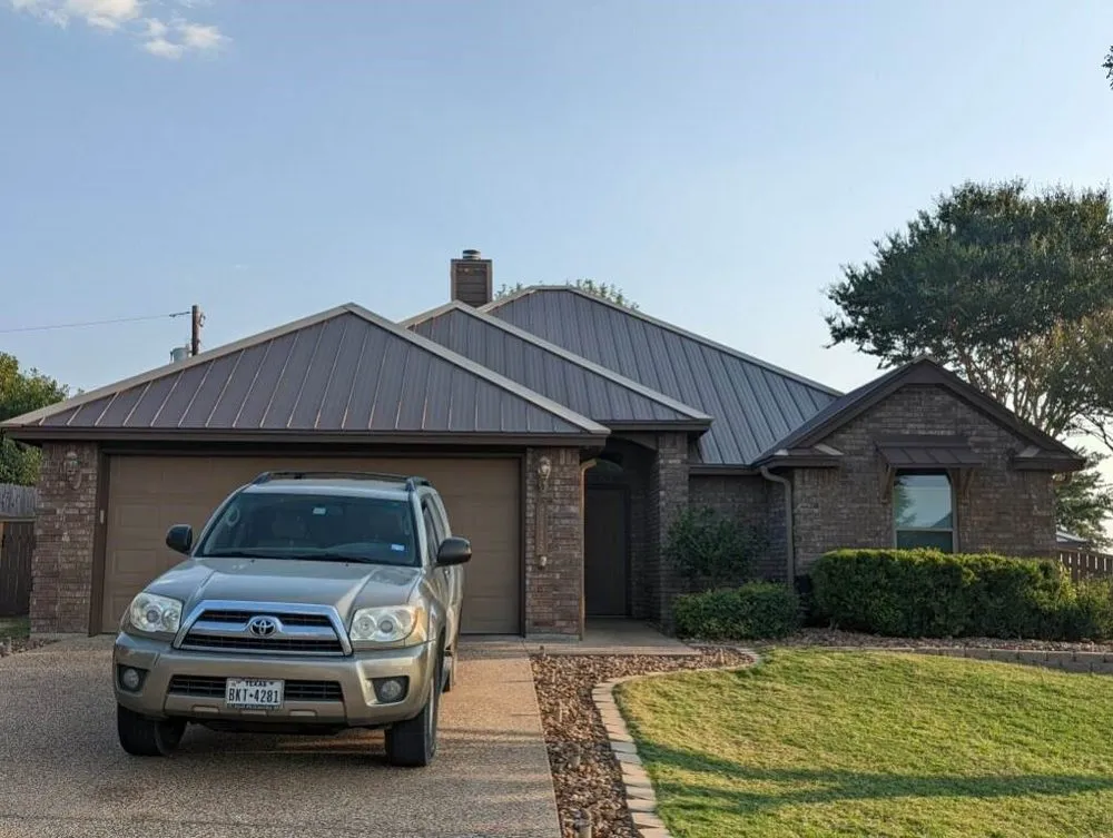 Slide of T2K Roofing