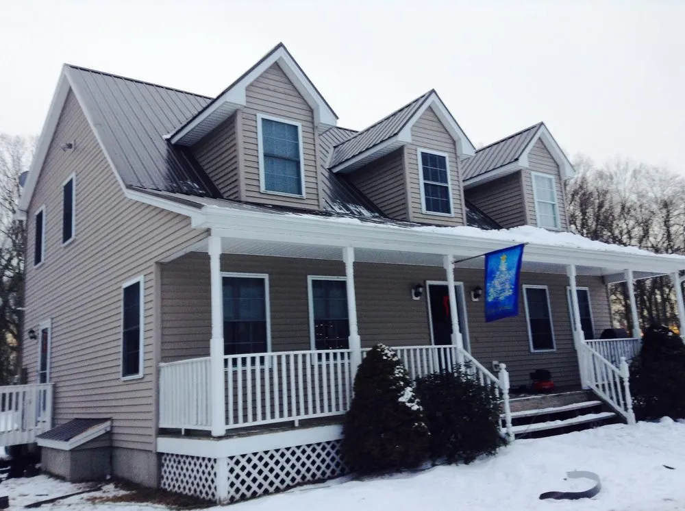 Slide of TA Lema Roofing