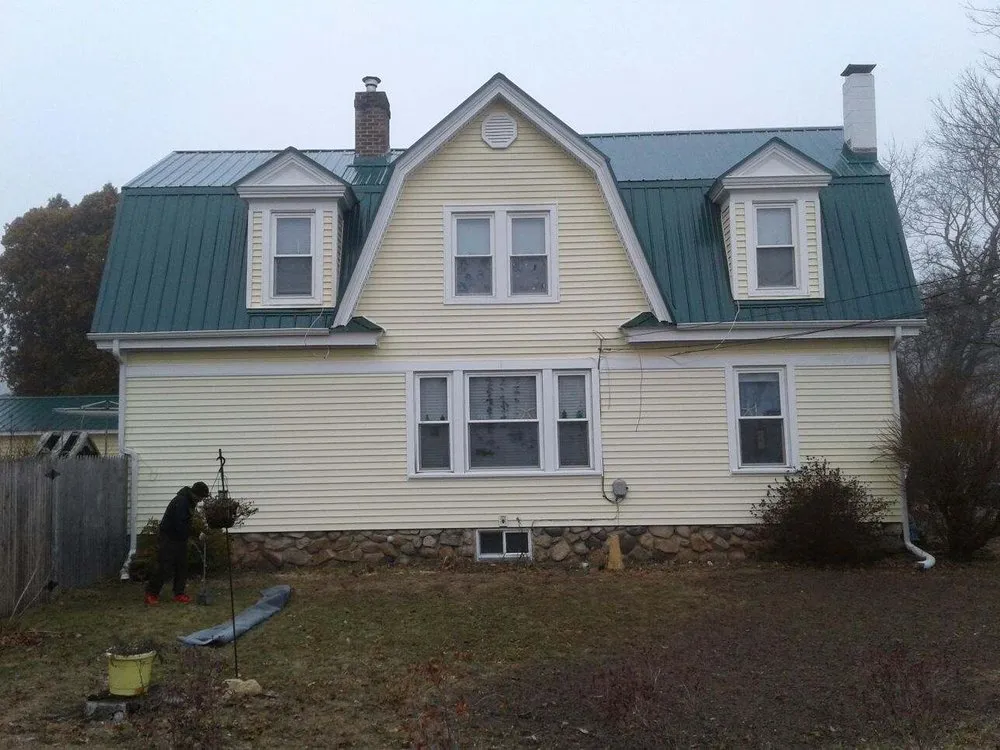 Slide of TA Lema Roofing