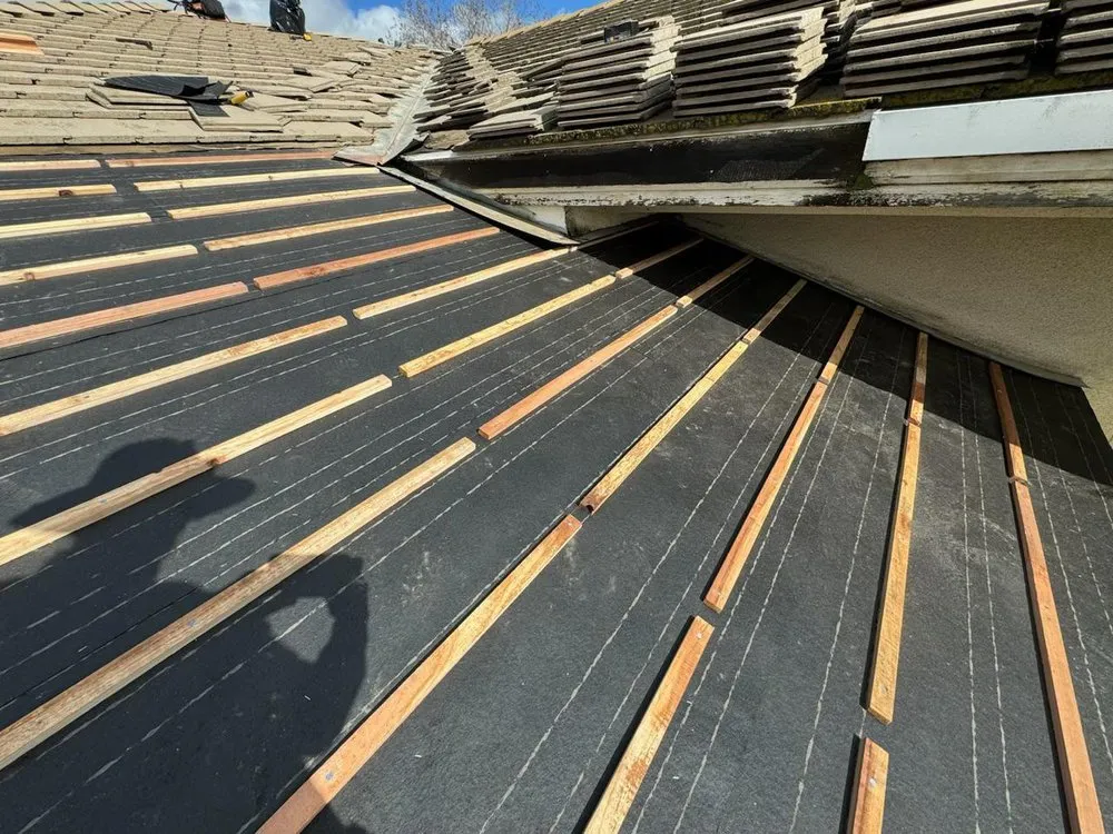 Slide of TAAG Roofing