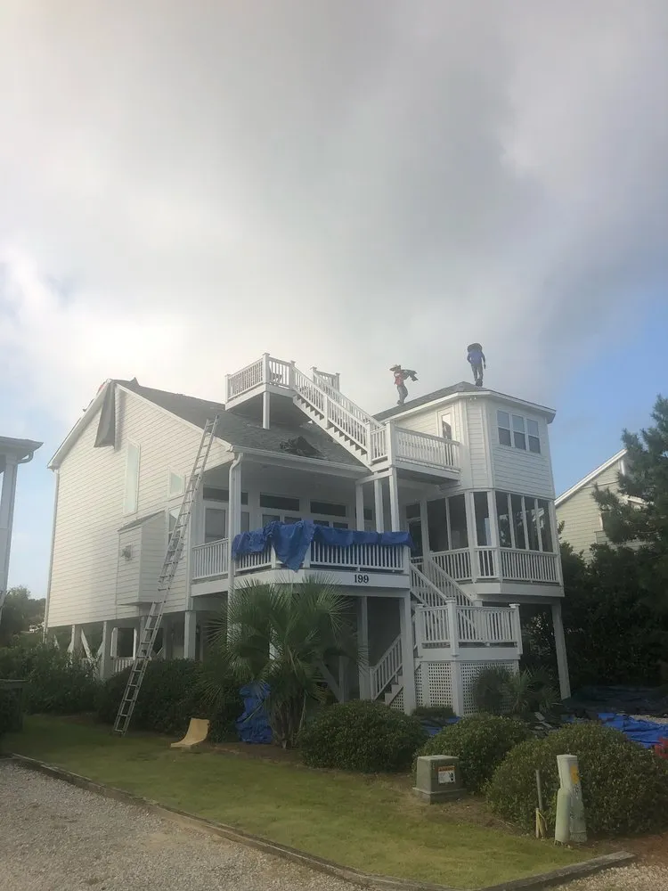 Reliable storm damage roof repair in Moorseviille, NC by Tabor Roofing
