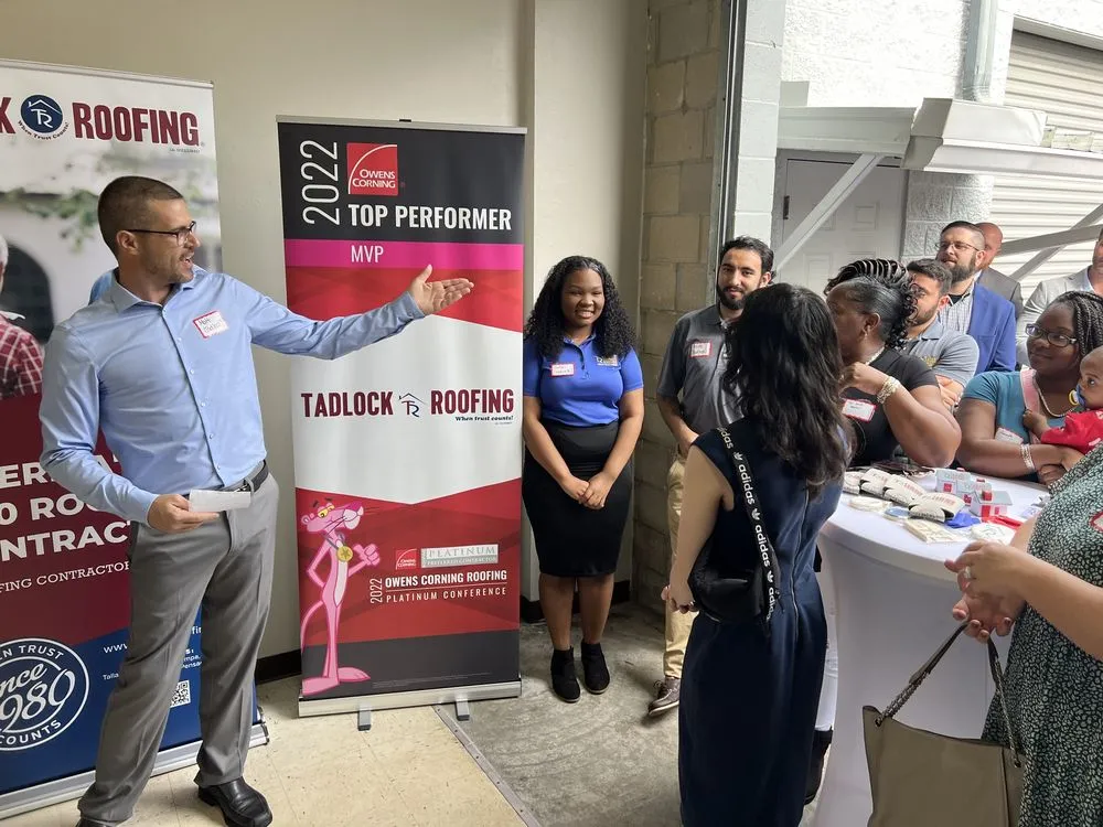 Slide of Tadlock Roofing