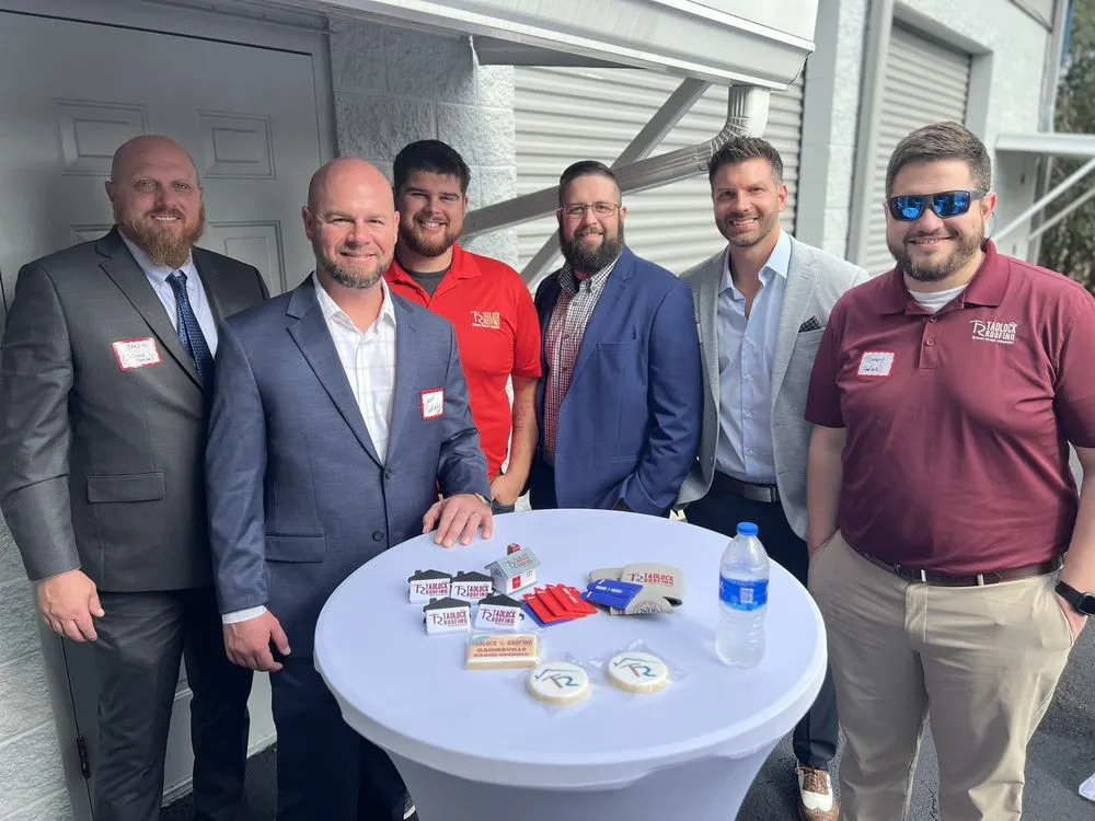 Slide of Tadlock Roofing