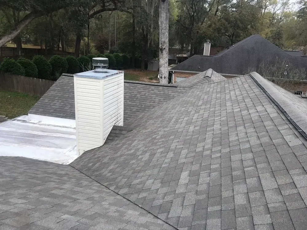 Slide of Tadlock Roofing