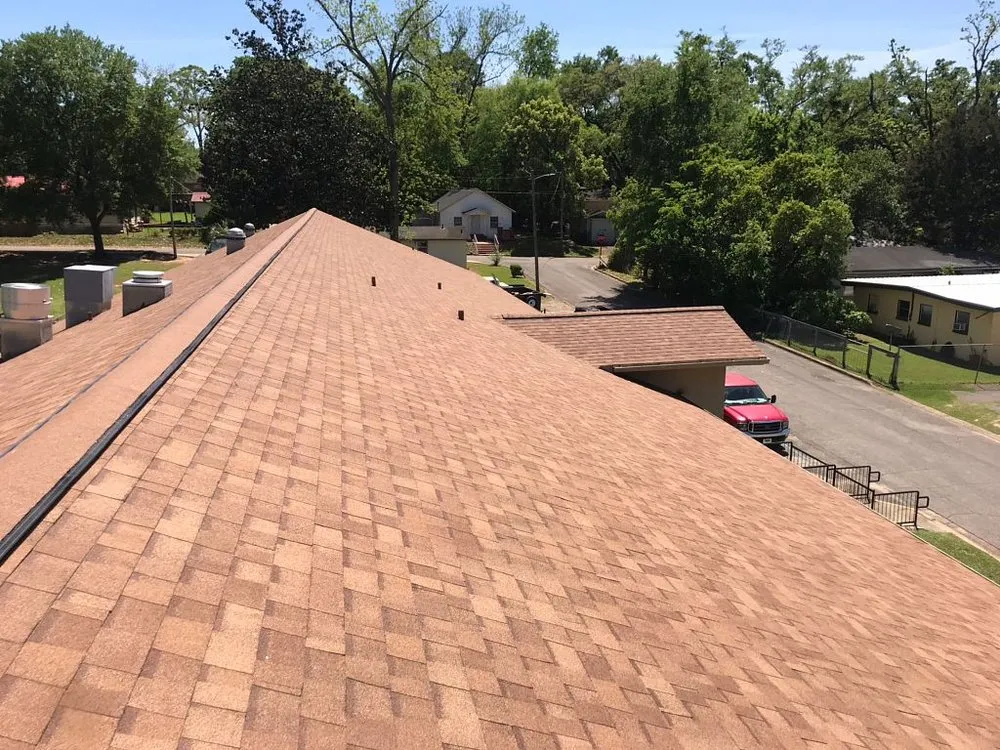 Slide of Tadlock Roofing
