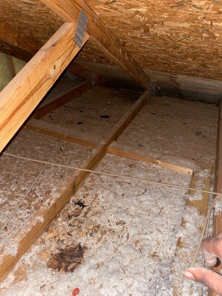 Slide of Tadlock Roofing