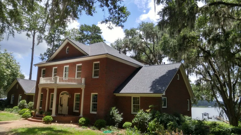 Slide of Tadlock Roofing