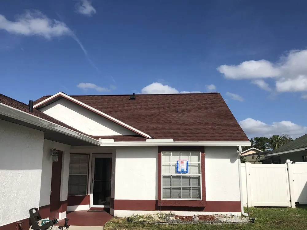 Slide of Tadlock Roofing