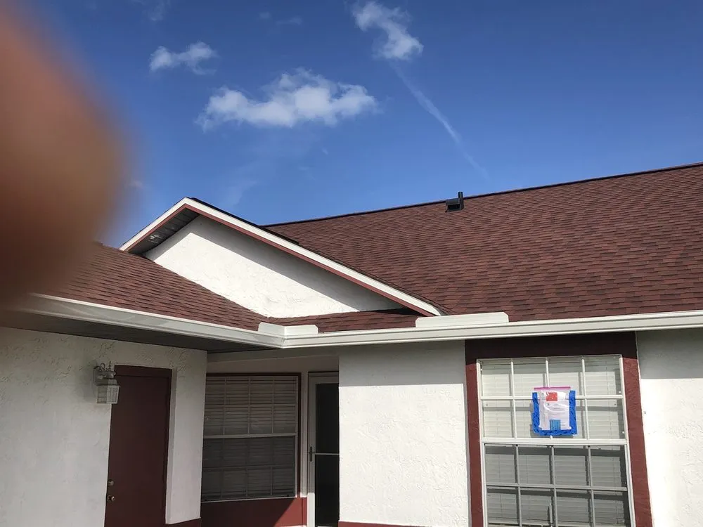 Slide of Tadlock Roofing