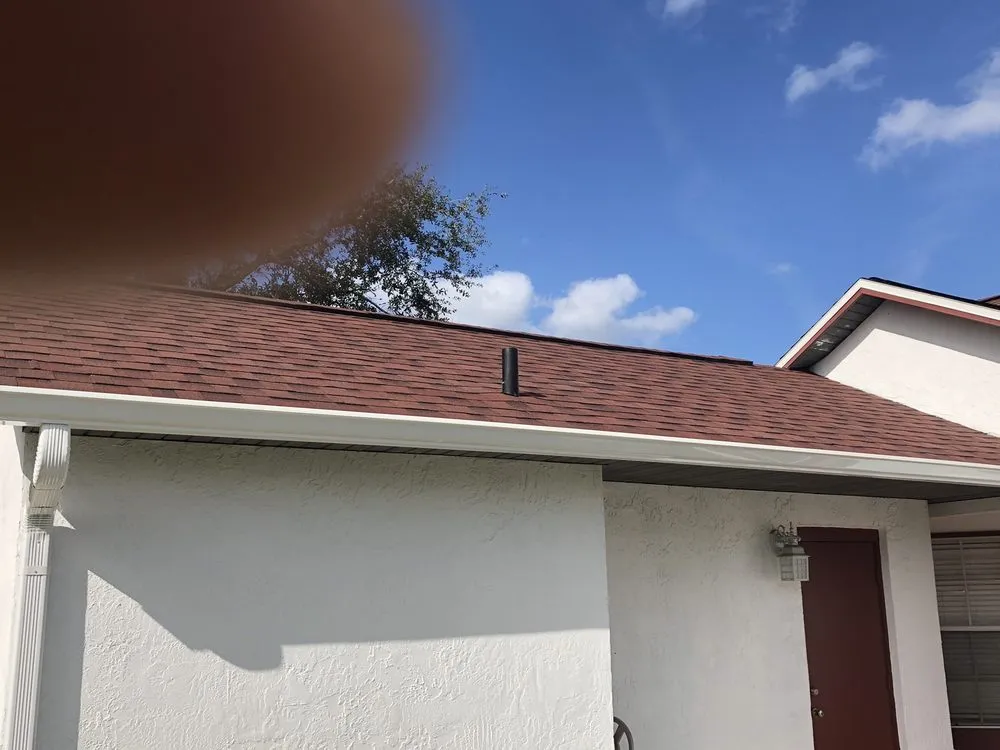 Slide of Tadlock Roofing