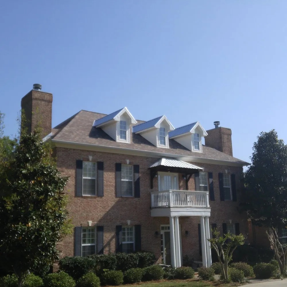 Slide of Tadlock Roofing