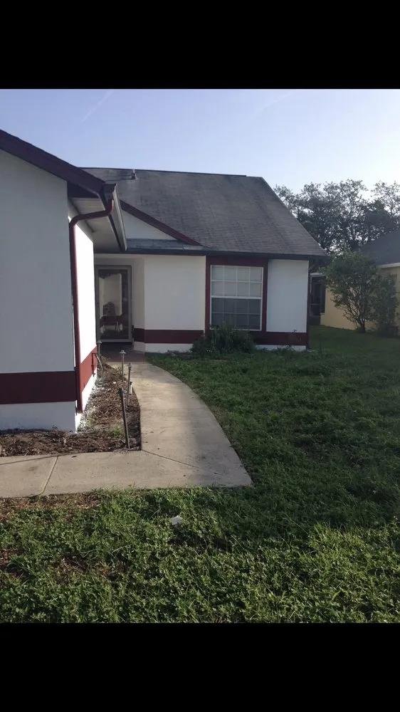 Slide of Tadlock Roofing
