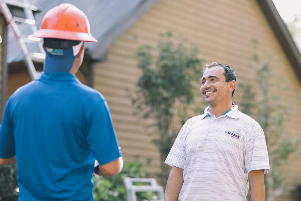 Slide of Tadlock Roofing