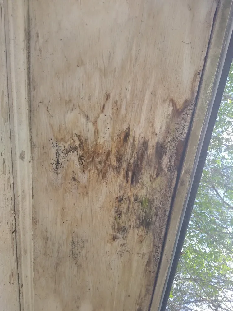 Slide of Tadlock Roofing