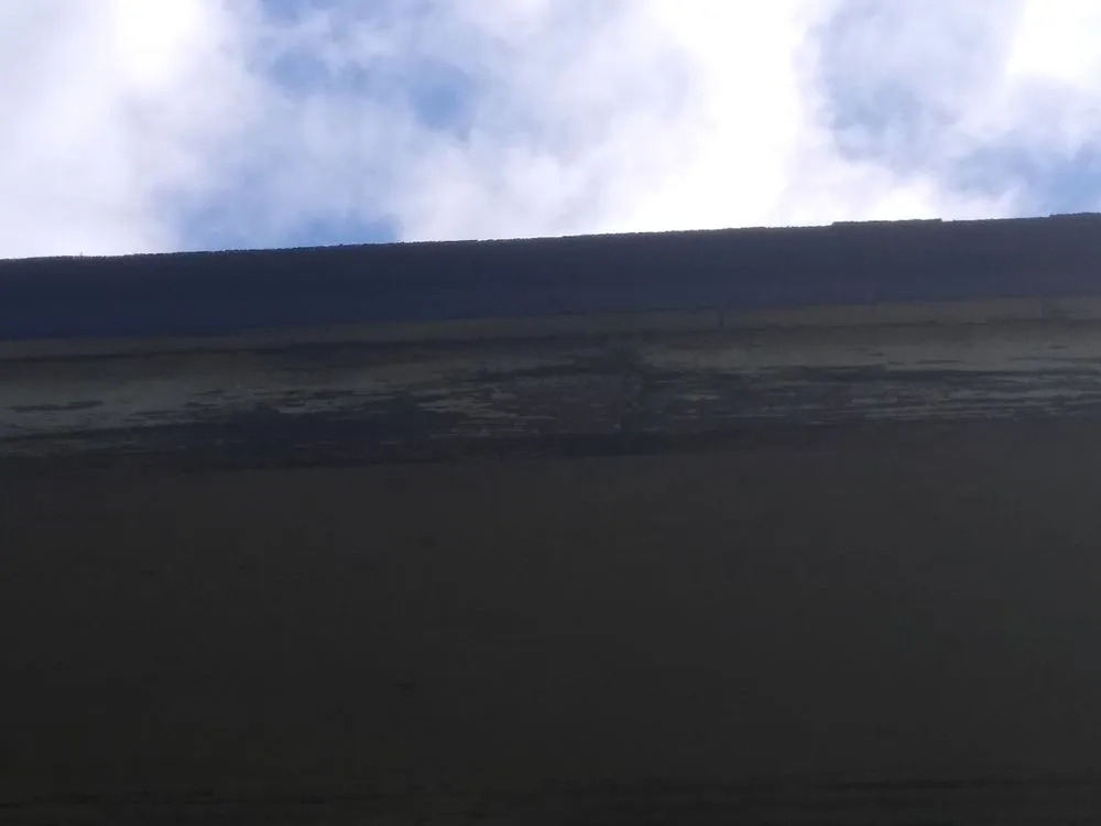 Slide of Tadlock Roofing